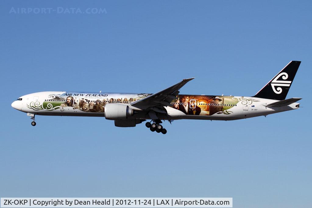 ZK-OKP, 2011 Boeing 777-306/ER C/N 39041, Air New Zealand 'Hobbit' ZK-OKP (FLT ANZ2) from Auckland (NZAA/AKL) on short final to RWY 24L. Maiden flight in the new scheme.