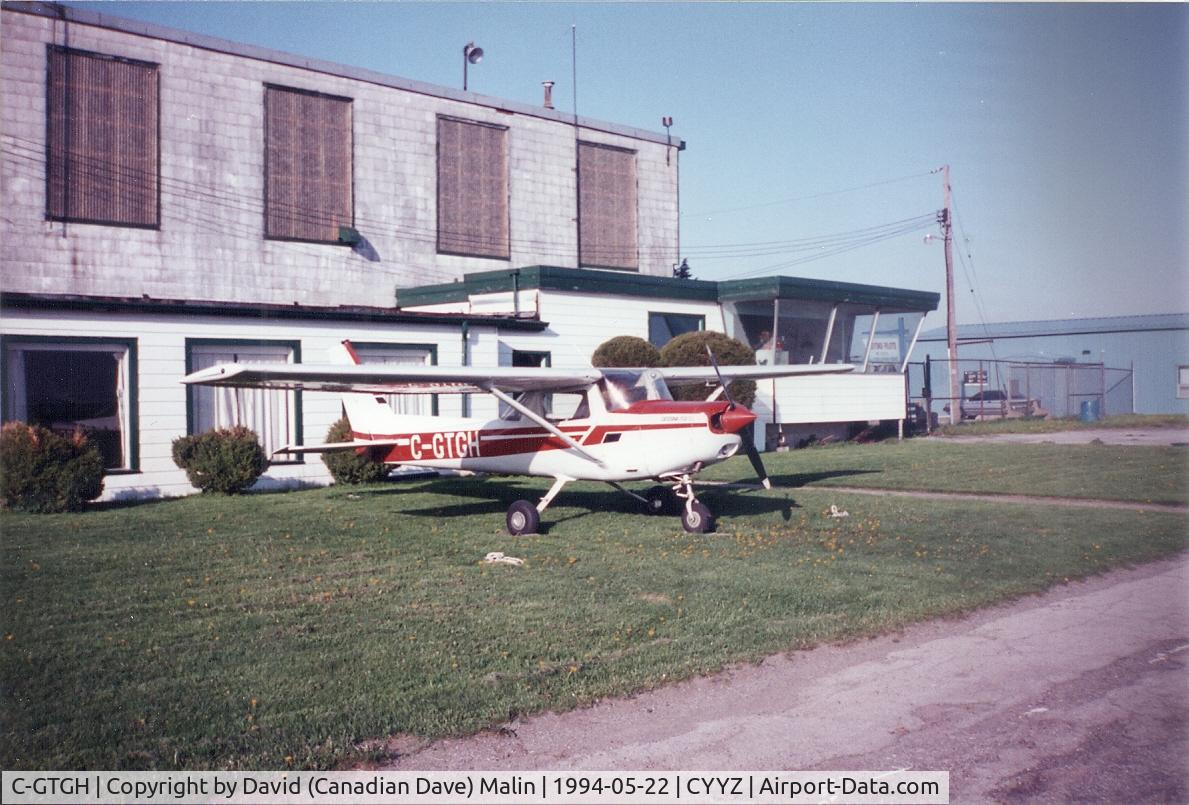C-GTGH, 1979 Cessna 152 C/N 15283075, Owned by Areo Futures in red colour scheme. Tied down outside Peninsulair hanger.