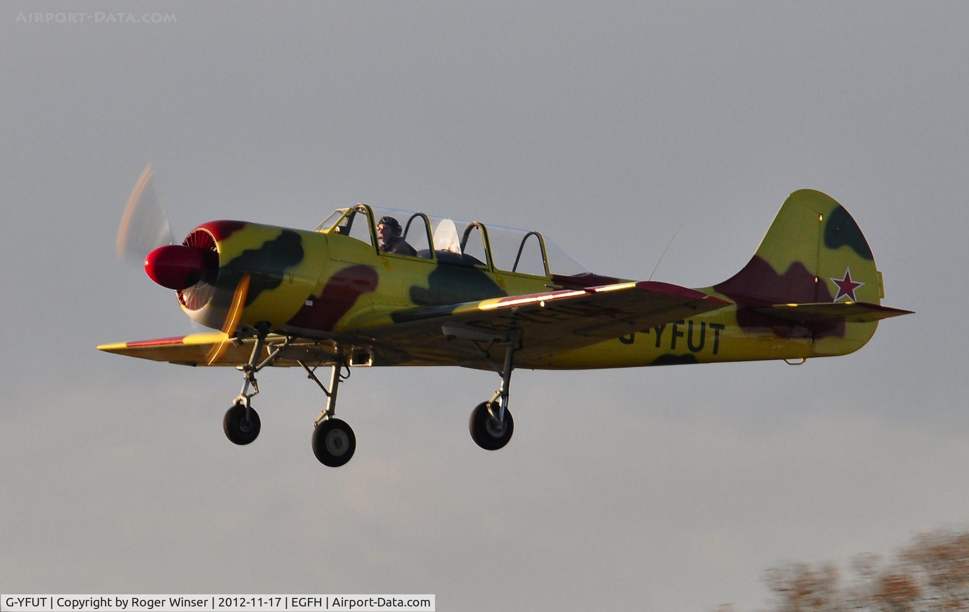 G-YFUT, 1988 Bacau Yak-52 C/N 888410, Morning departure. Visiting Yak-52 returning to base.