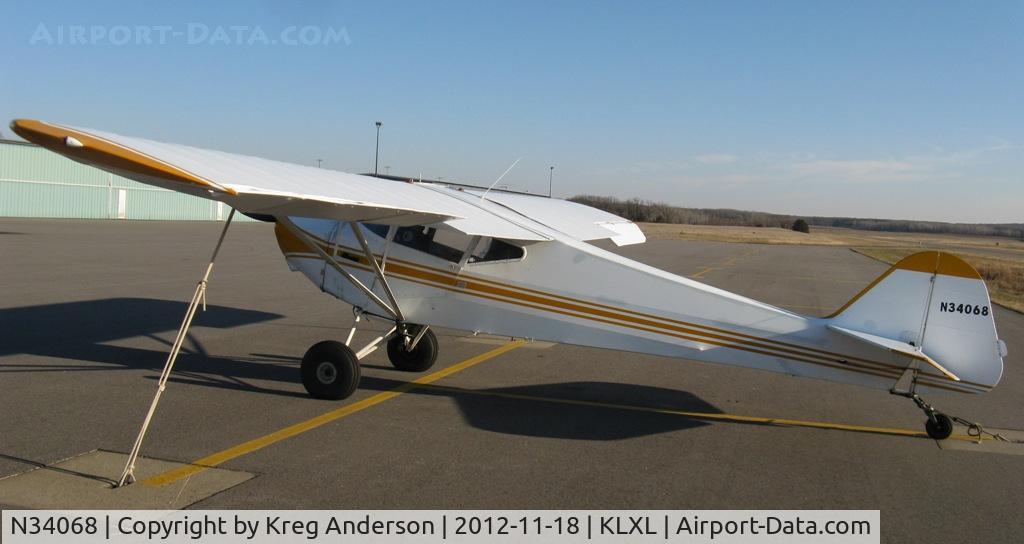 N34068, 1941 Taylorcraft BCS-12-65 C/N 2932, Taylorcraft BCS12-65 on the line in Little Falls, Mn.