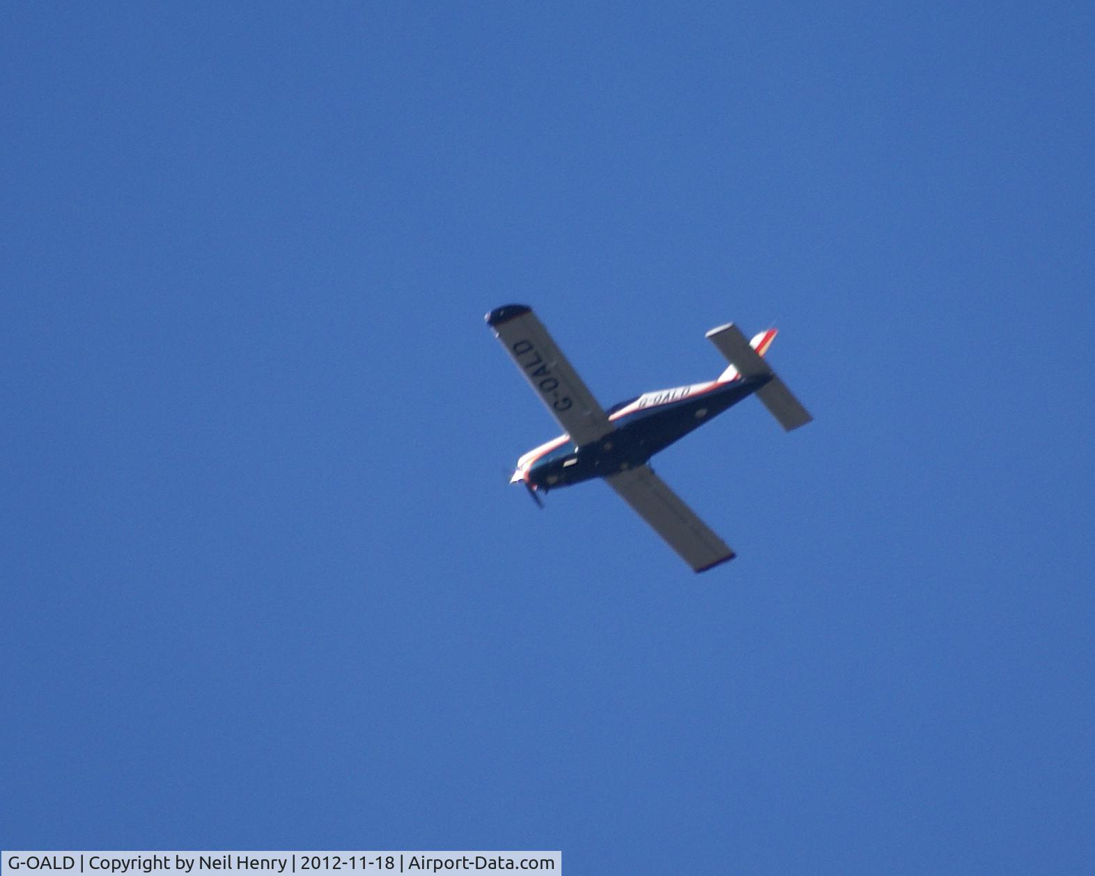 G-OALD, 1985 Socata TB-20 Trinidad C/N 490, Taken from the ground - flying over Winkworth Arboretum, near Godalming, Surrey, UK on 18 November 2012 about 12:30pm