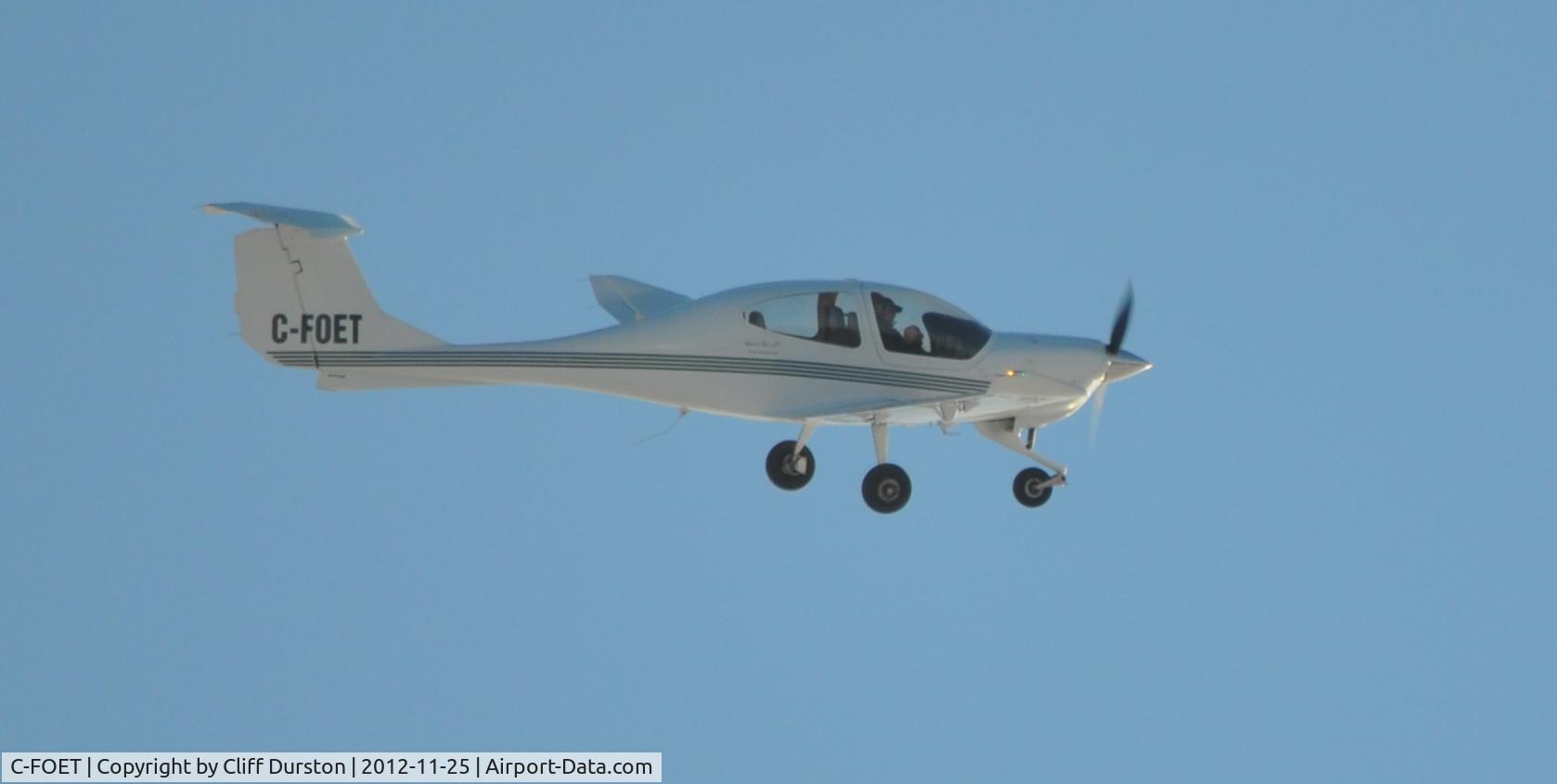 C-FOET, 2004 Diamond DA-40 Diamond Star C/N 40.457, Flypass at Silver Harbour, Manitoba near Arnes