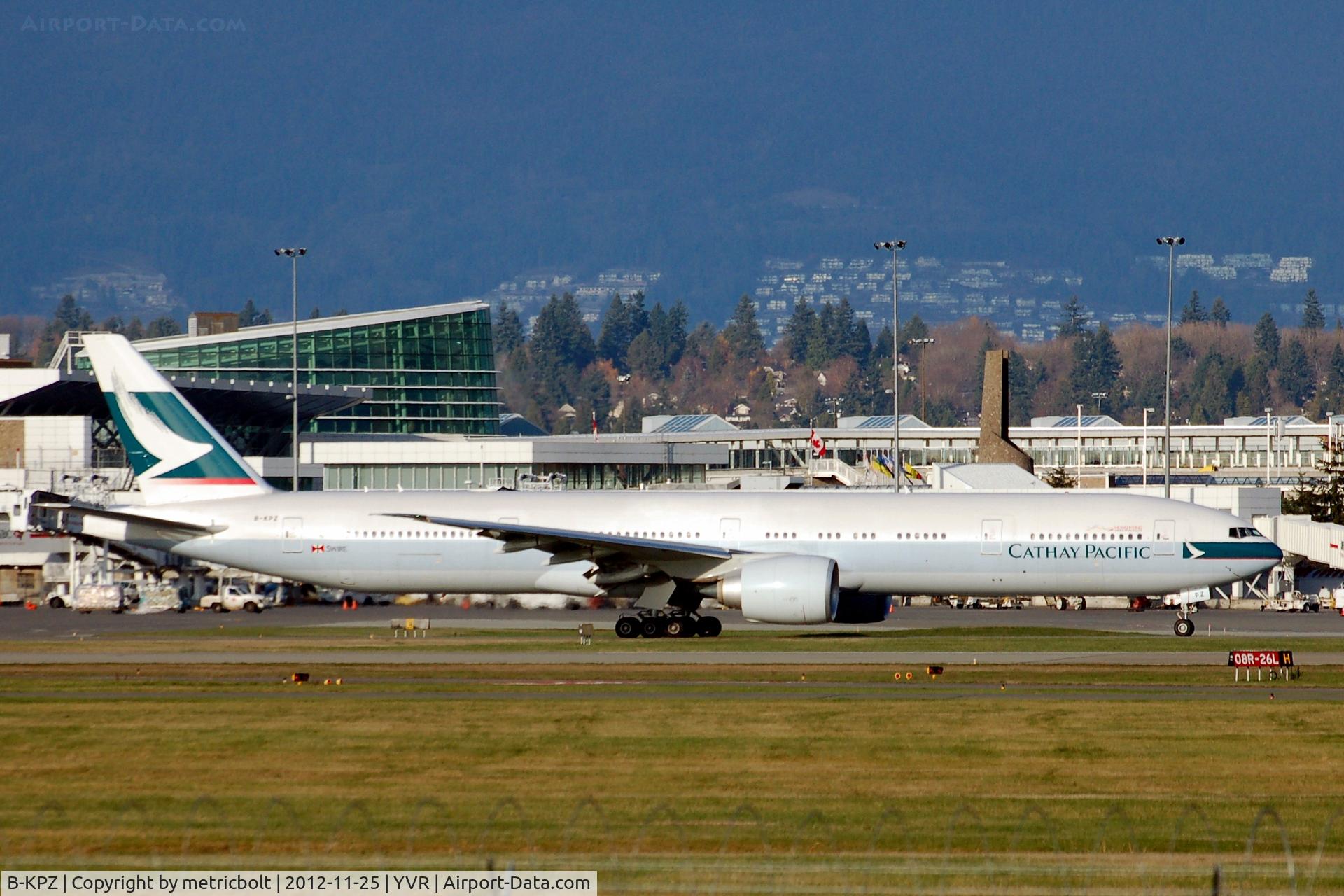 B-KPZ, 2012 Boeing 777-367/ER C/N 37900, taxiing to departure for Hong Kong.