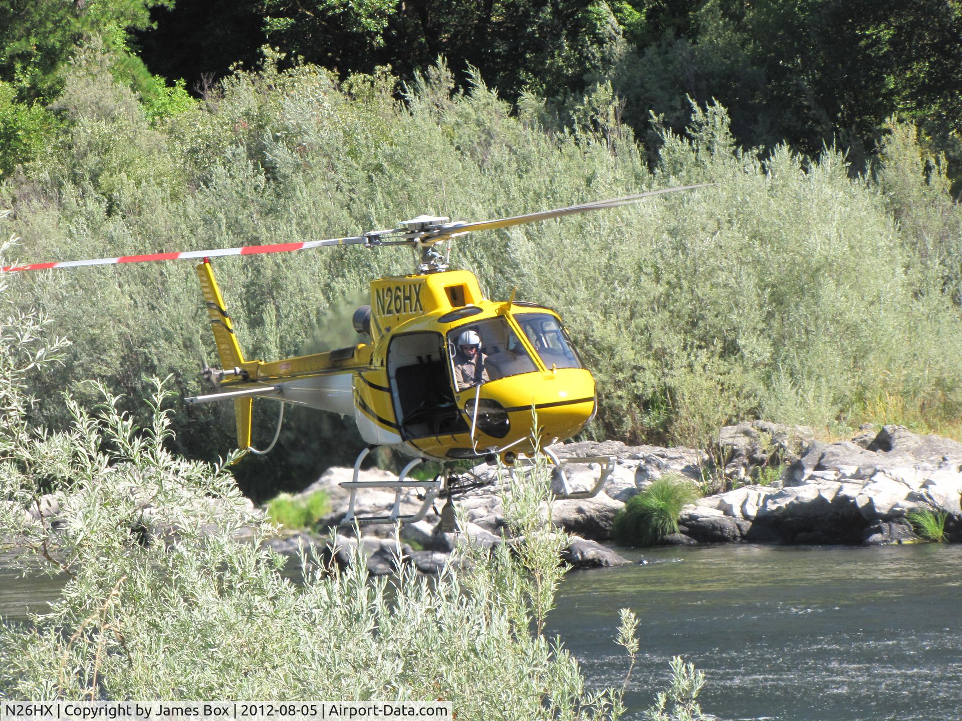 N26HX, 2007 Eurocopter AS-350B-3 Ecureuil Ecureuil C/N 4385, fire fighting in Aug. 2012, taking water from the Klamath River near Seiad, California