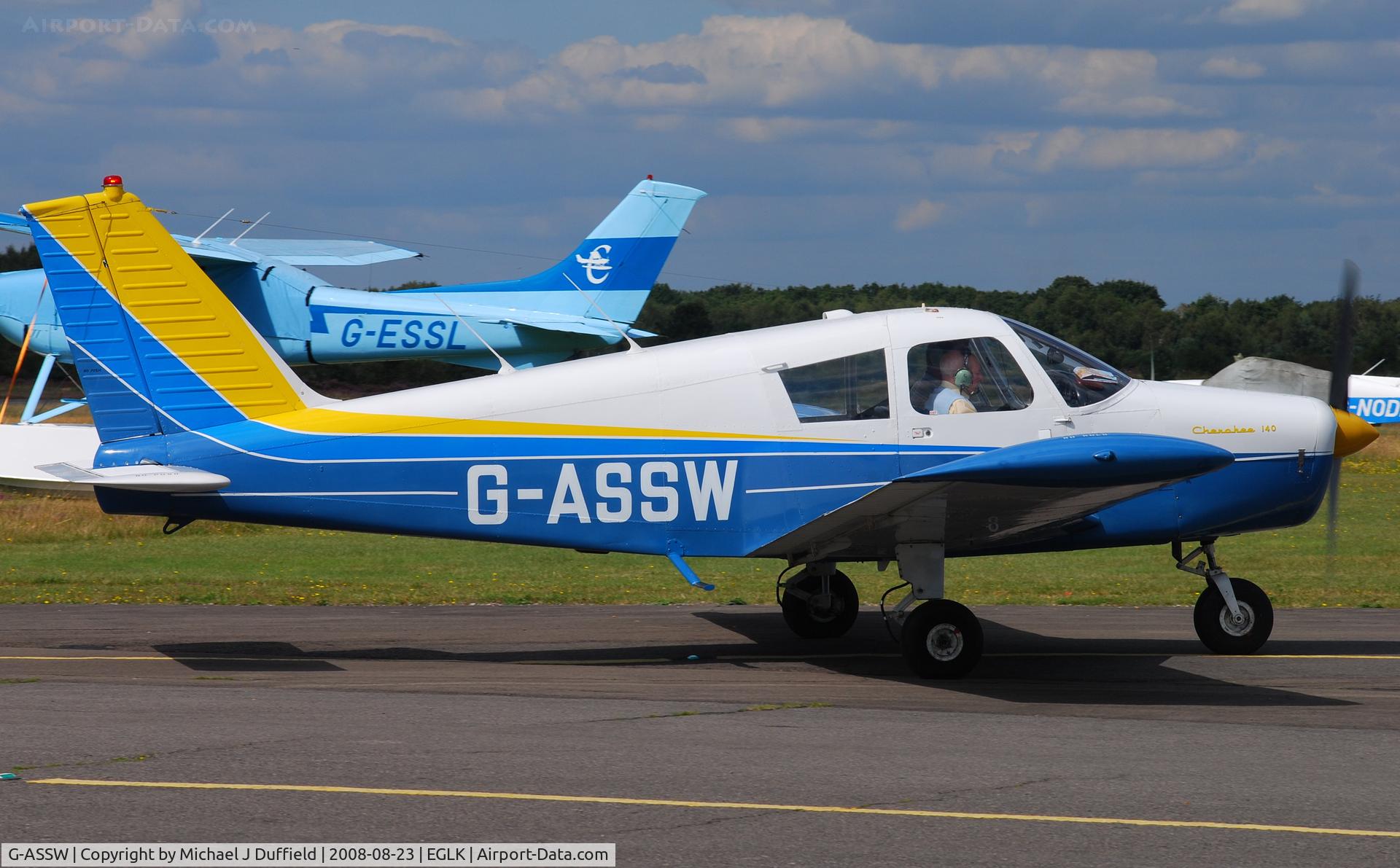 G-ASSW, 1964 Piper PA-28-140 Cherokee C/N 28-20055, Colourful Cherokee 140 visiting Blackbushe on 23rd August 2008