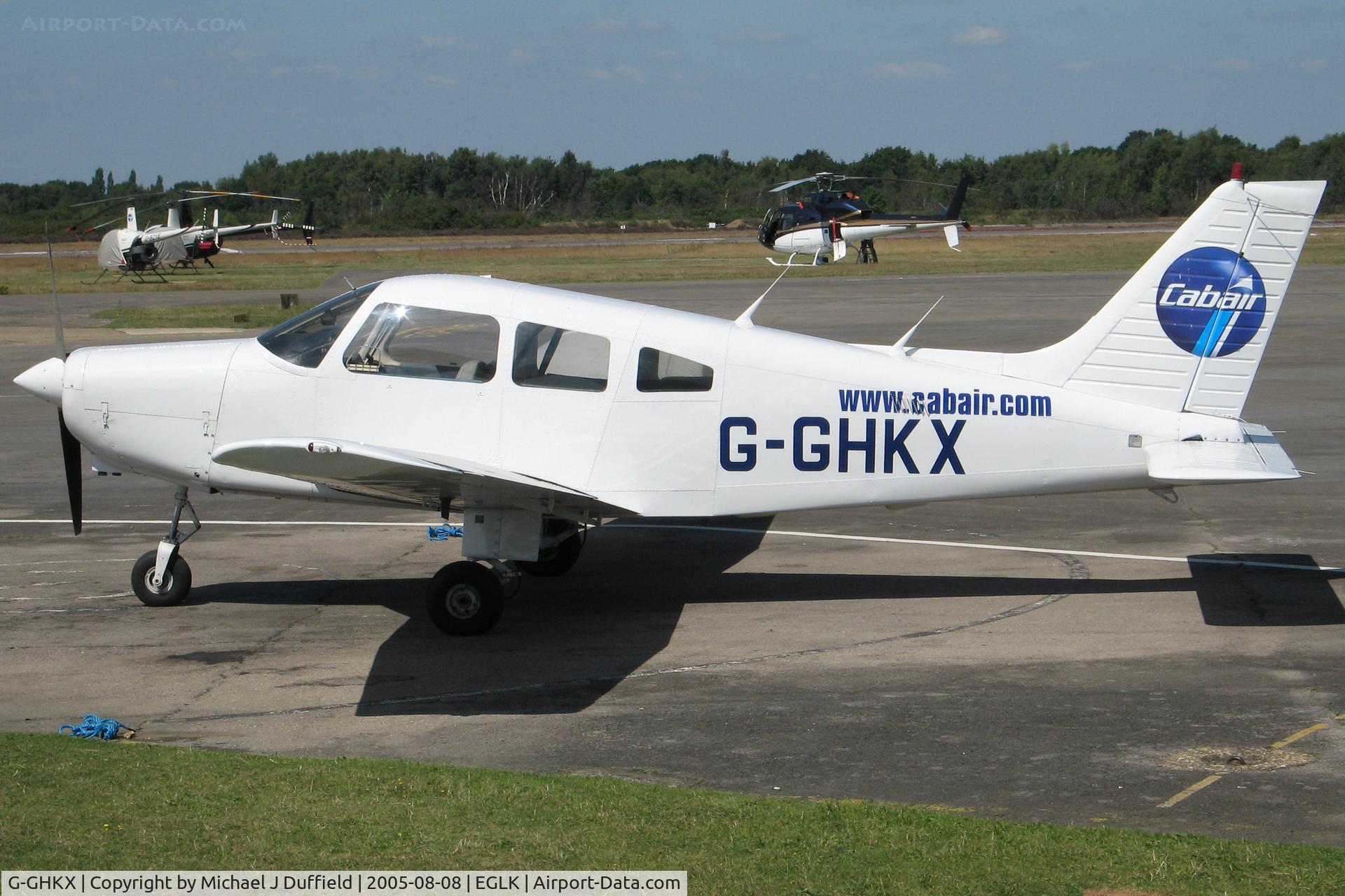 G-GHKX, 1982 Piper PA-28-161 Cherokee Warrior II C/N 28-8416005, Piper Warrior of Cabair seen at Blackbushe on 8th August 2005