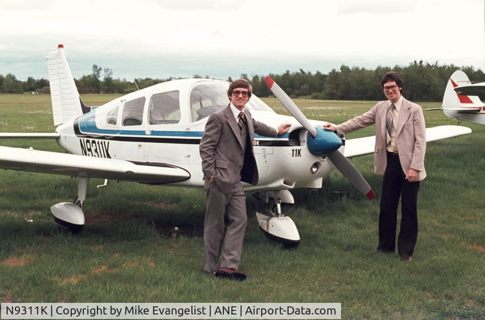 N9311K, 1976 Piper PA-28-151 C/N 28-7615195, Joe Talcott & Steve Keller at Anoka County Blaine Airport (Minnesota). c 1980