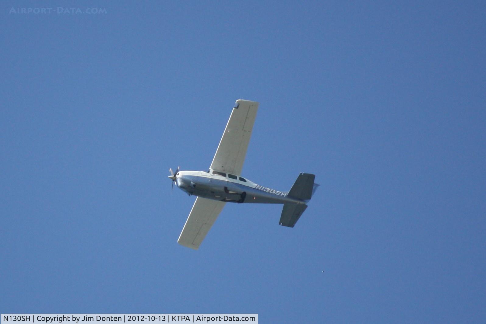 N130SH, 1968 Cessna 210H Centurion C/N 21059060, Cessna Centurion (N130SH) flies over Buchan Airport