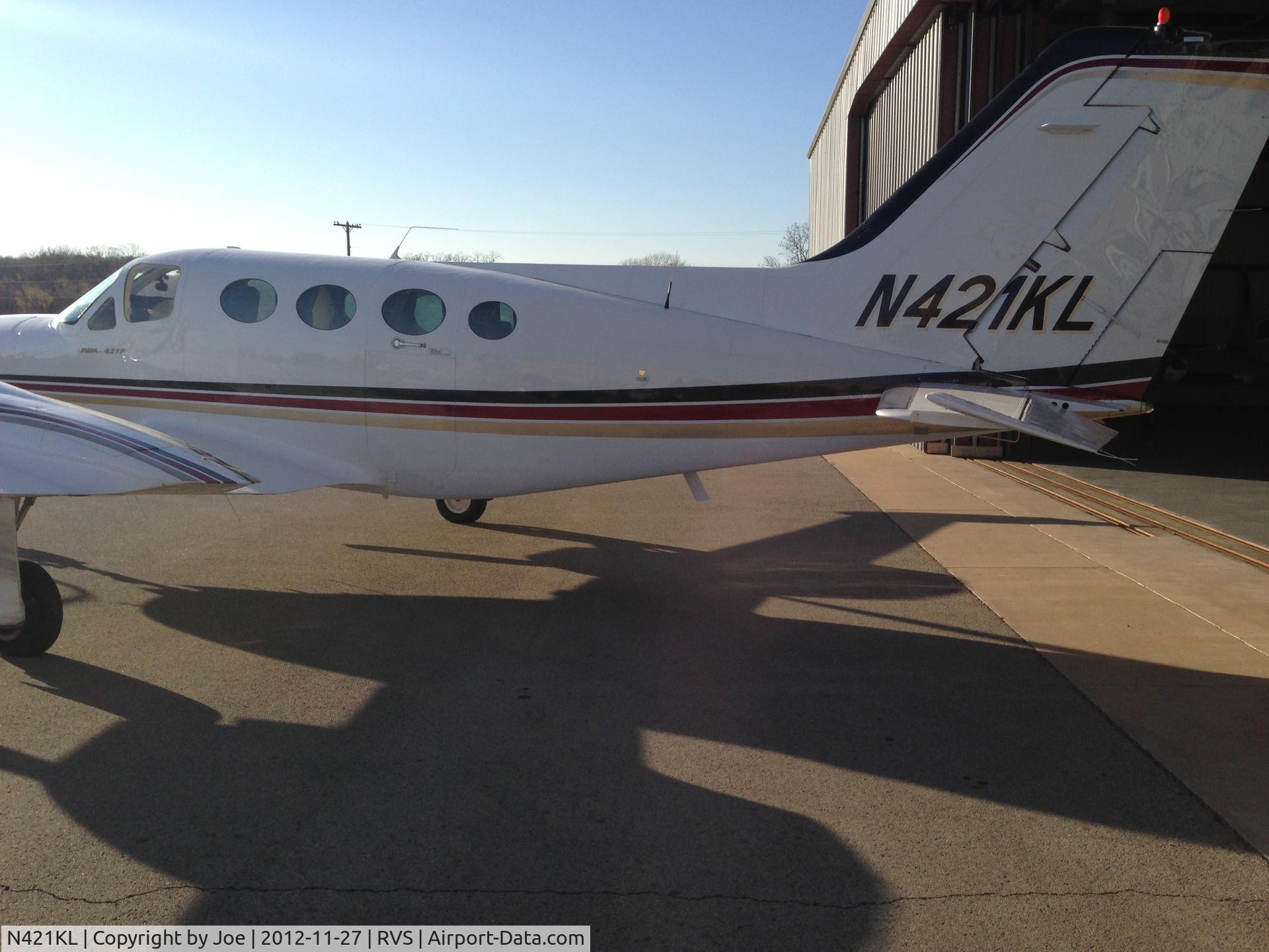 N421KL, 1970 Cessna 421B Golden Eagle C/N 421B0015, At RVS being push back to the hanger