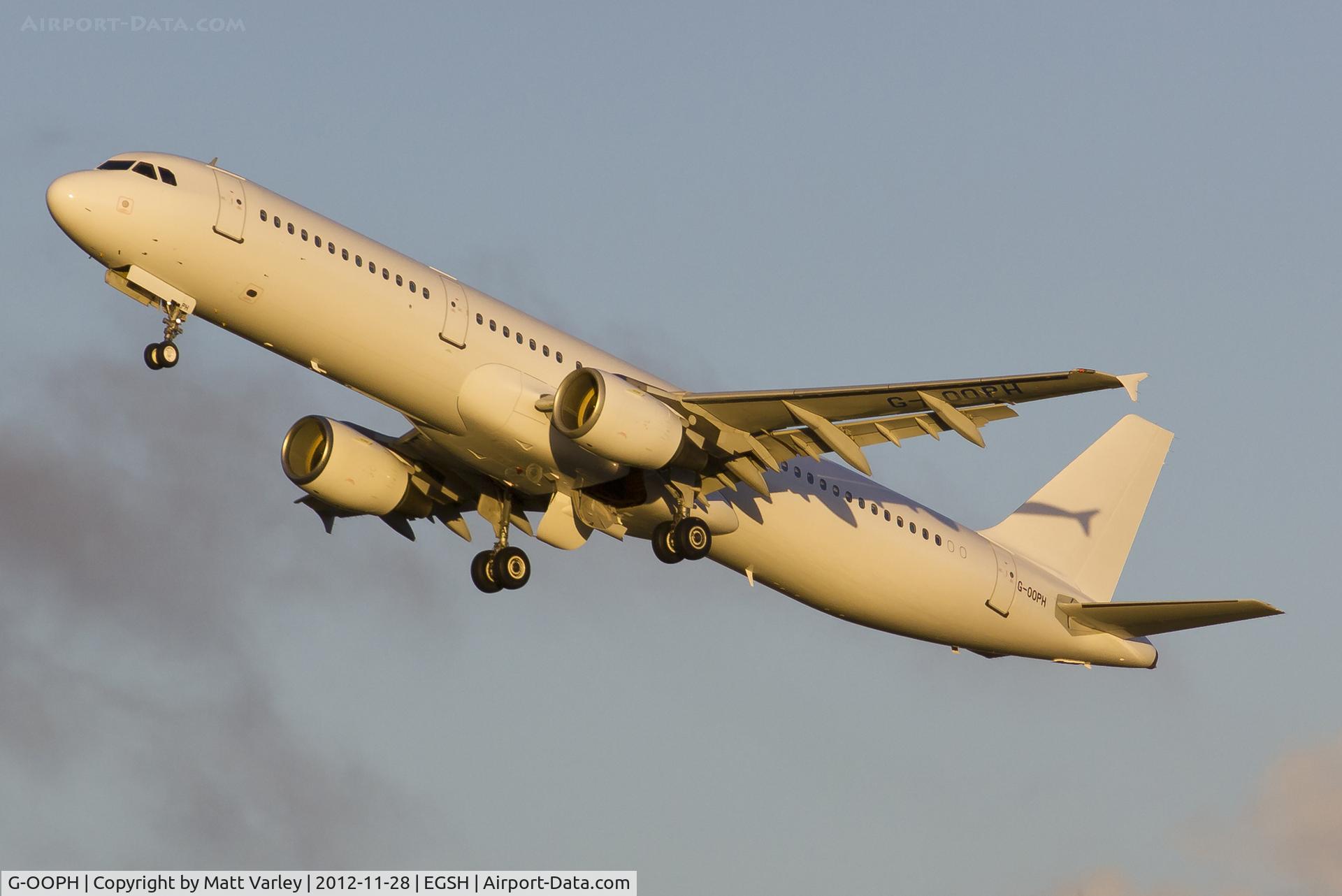 G-OOPH, 1998 Airbus A321-211 C/N 781, Climbing out of EGSH in the setting sun.