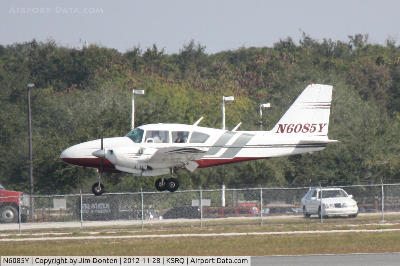N6085Y, 1966 Piper PA-23-250 C/N 27-3287, Piper Apache (N6085Y) arrives at Sarasota-Bradenton International Airport following a flight from John Bell Williams Airport