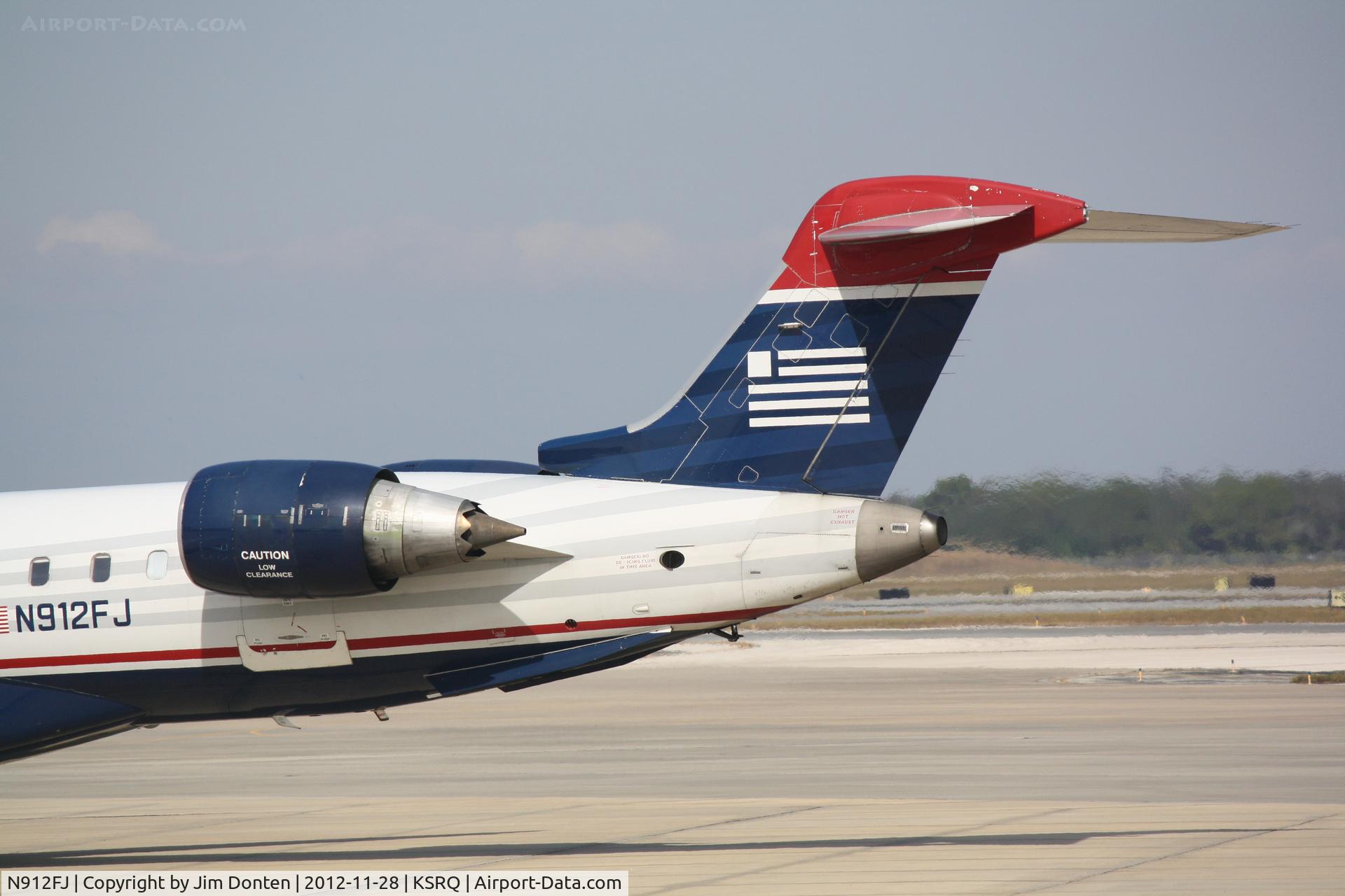 N912FJ, 2004 Bombardier CRJ-900ER (CL-600-2D24) C/N 15012, US Air Flight 2687 operated by Mesa (N912FJ) prepares for flight at Sarasota-Bradenton International Airport