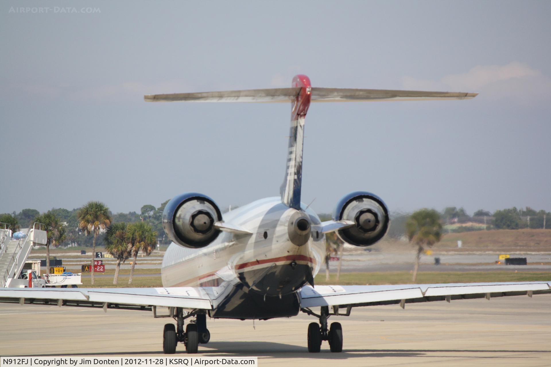 N912FJ, 2004 Bombardier CRJ-900ER (CL-600-2D24) C/N 15012, US Air Flight 2687 operated by Mesa (N912FJ) prepares for flight at Sarasota-Bradenton International Airport