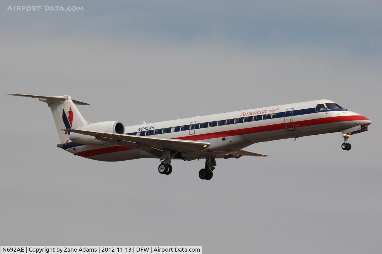 N692AE, 2004 Embraer ERJ-145LR (EMB-145LR) C/N 14500866, American Eagle landing at DFW Airport