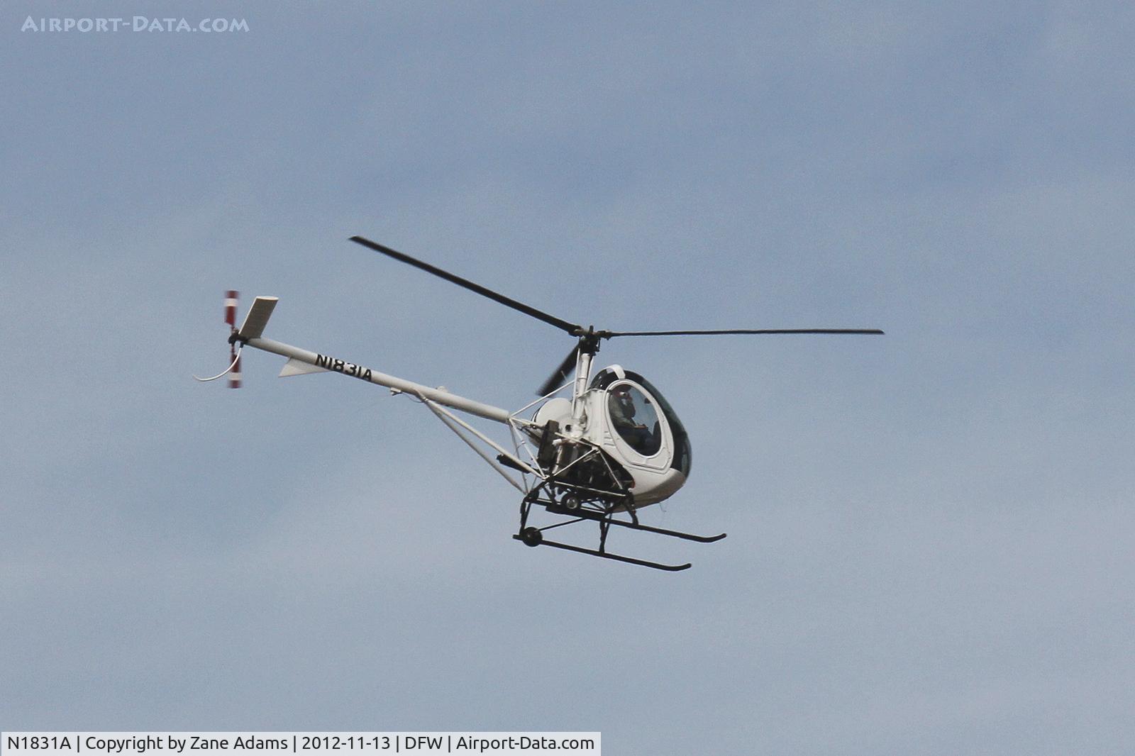N1831A, 2005 Schweizer 269C-1 C/N 0228, Seen doing pipeline patrol near DFW Airport
