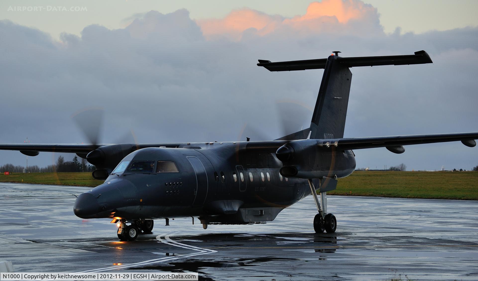 N1000, 1985 De Havilland Canada DHC-8-102 Dash 8 C/N 024, Arriving to a wet welcome !