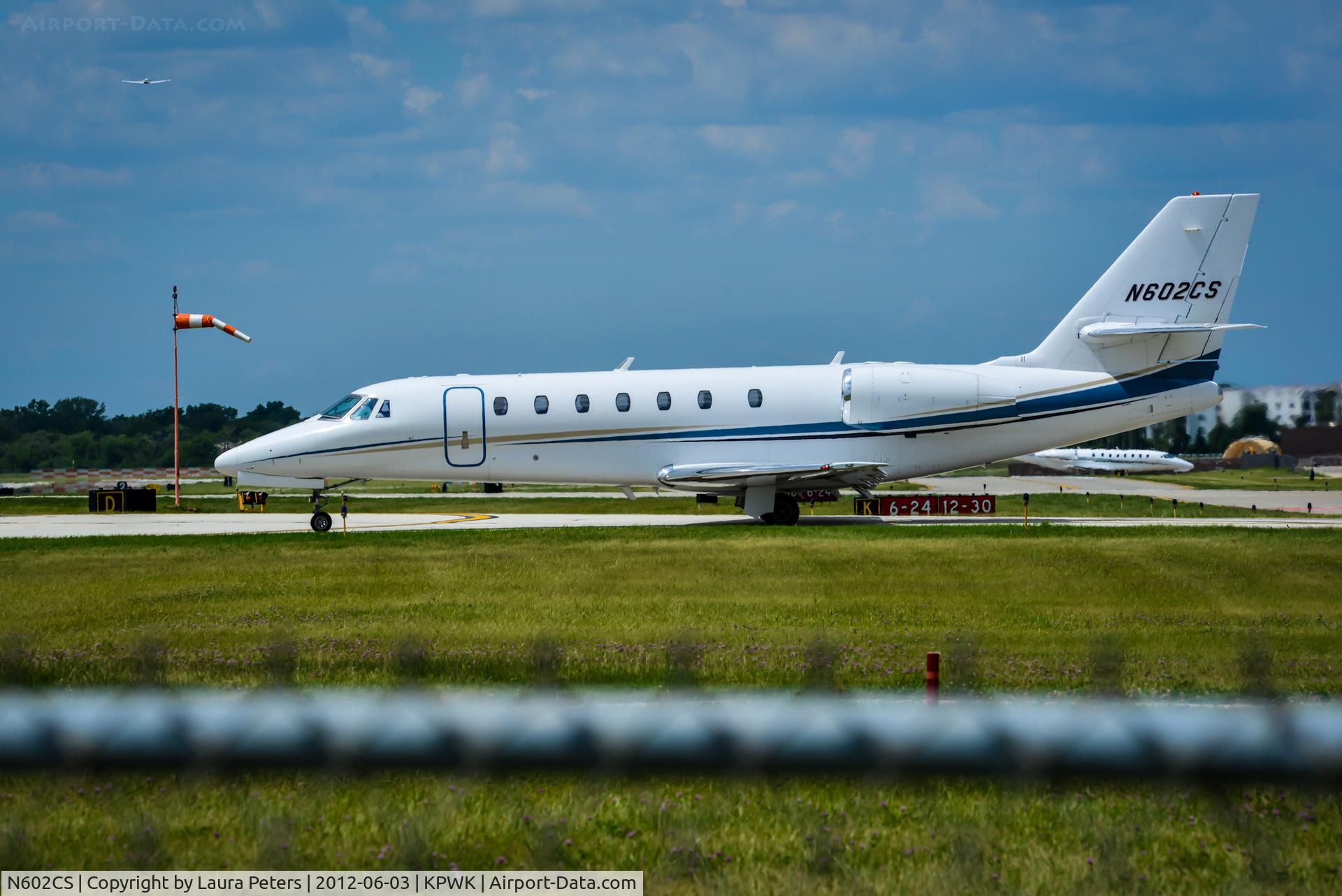 N602CS, 2005 Cessna 680 Citation Sovereign C/N 6800003, Waiting to depart Chicago Executive Airport
