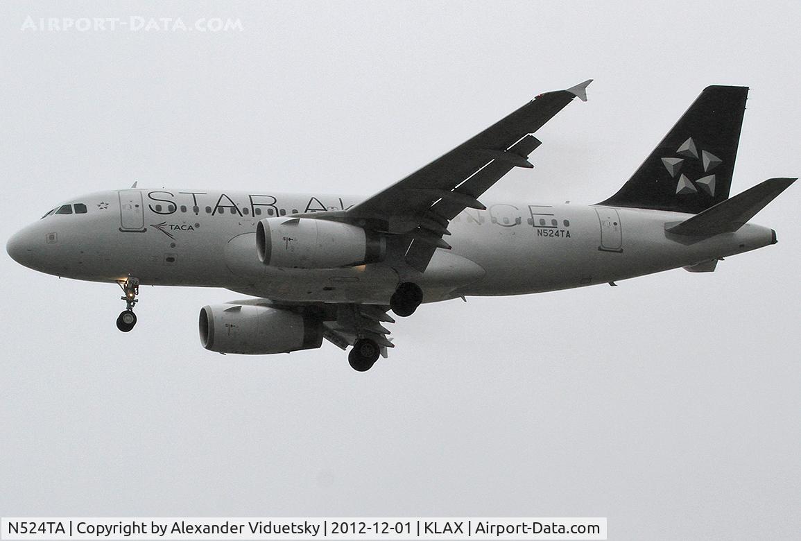 N524TA, 2012 Airbus A319-132 C/N 5280, Landing at the LAX in the rain and fog.