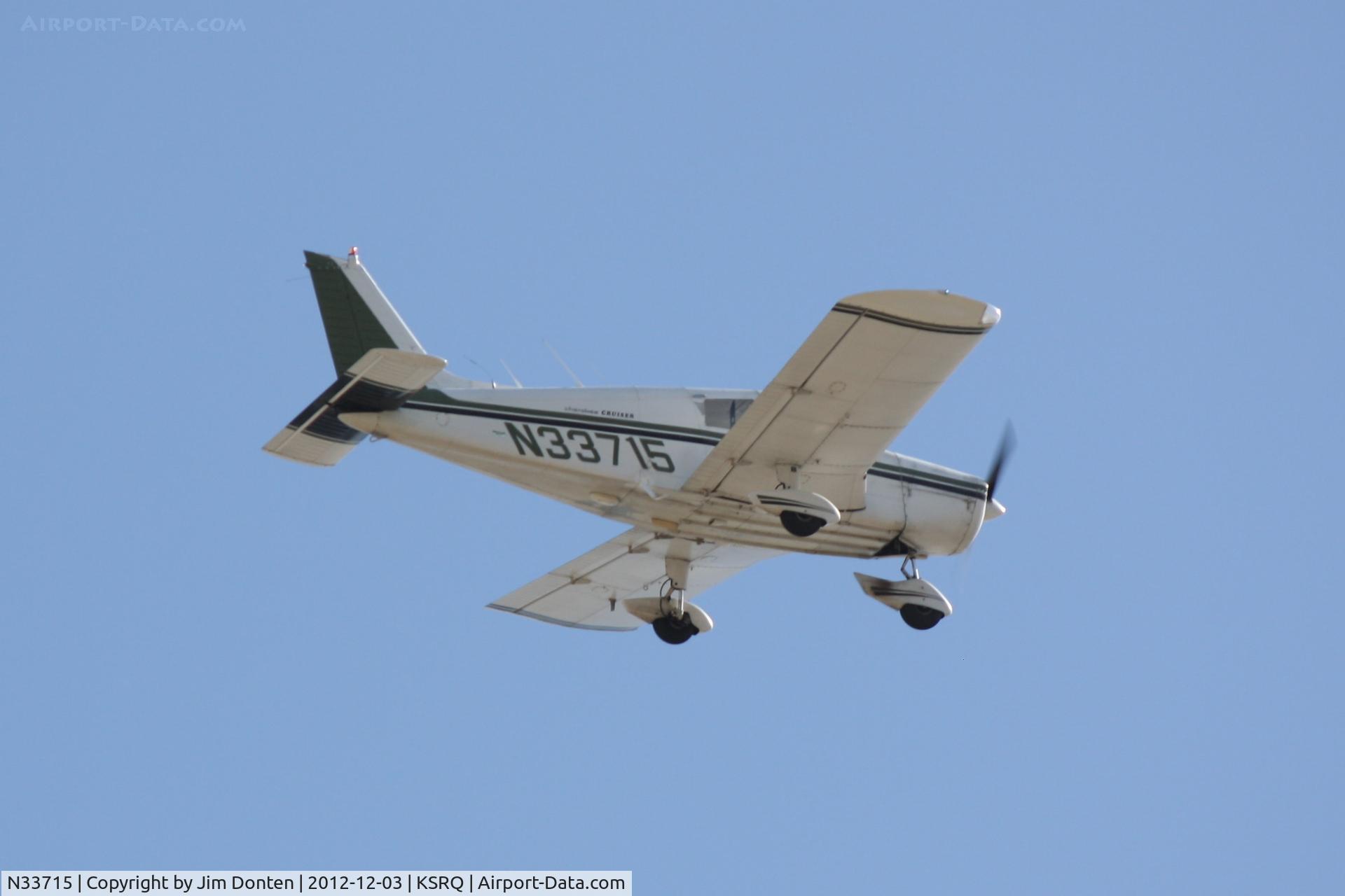 N33715, 1975 Piper PA-28-140 C/N 28-7525231, Piper Cherokee (N33715) departs Sarasota-Bradenton International Airport enroute to Venice Municipal Airport