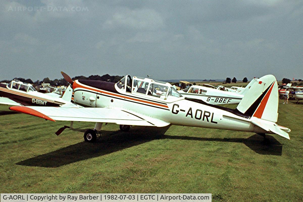 G-AORL, 1952 De Havilland DHC-1 Chipmunk T.10 C/N C1/0131, DHC-1 Chipmunk 22 [C1/0131] Cranfield~G 03/07/1982. Image taken from a slide.