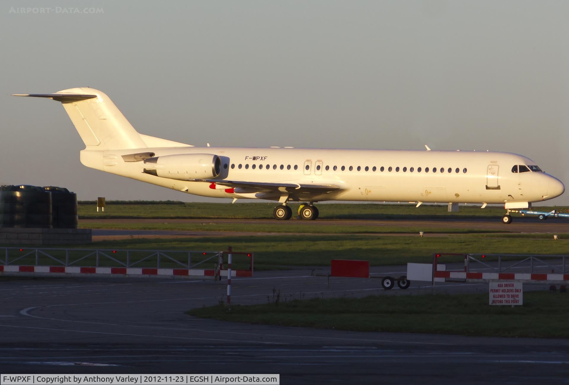 F-WPXF, 1991 Fokker 100 (F-28-0100) C/N 11330, Sat on stand.