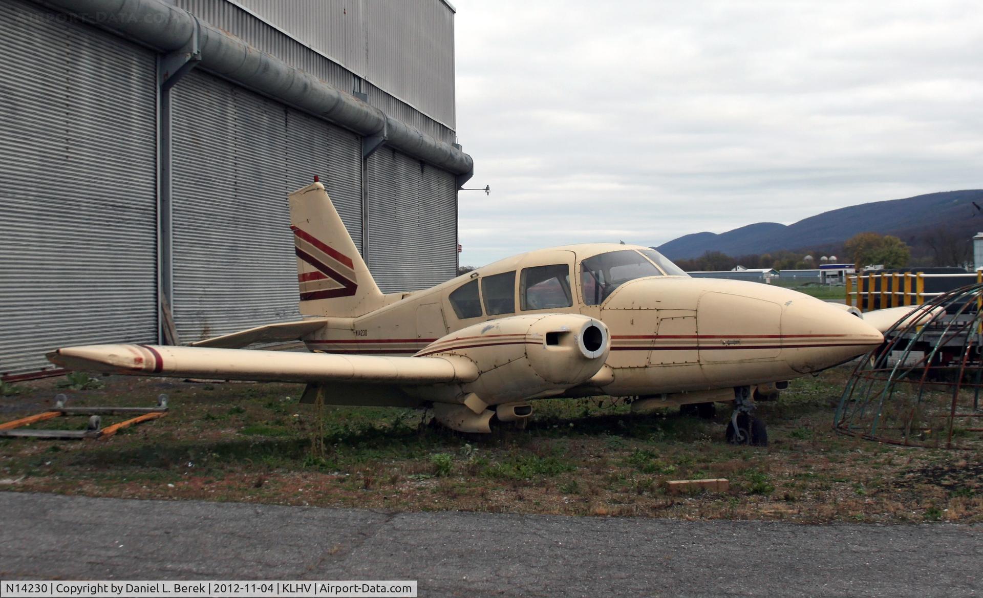 N14230, Piper PA-23-250 C/N 274788, It may look like junk, but I believe the William T. Piper has plans to restore this bird.