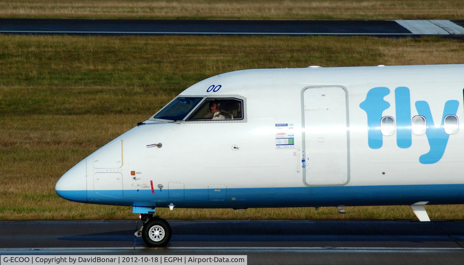 G-ECOO, 2009 De Havilland Canada DHC-8-402Q Dash 8 C/N 4237, A close study on Taxiway for a 06 departure