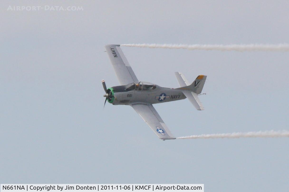 N661NA, 1957 North American T-28C Trojan Trojan C/N 226-238 (140661), A T-28 Trojan (N661NA) performs at MacDill Air Fest