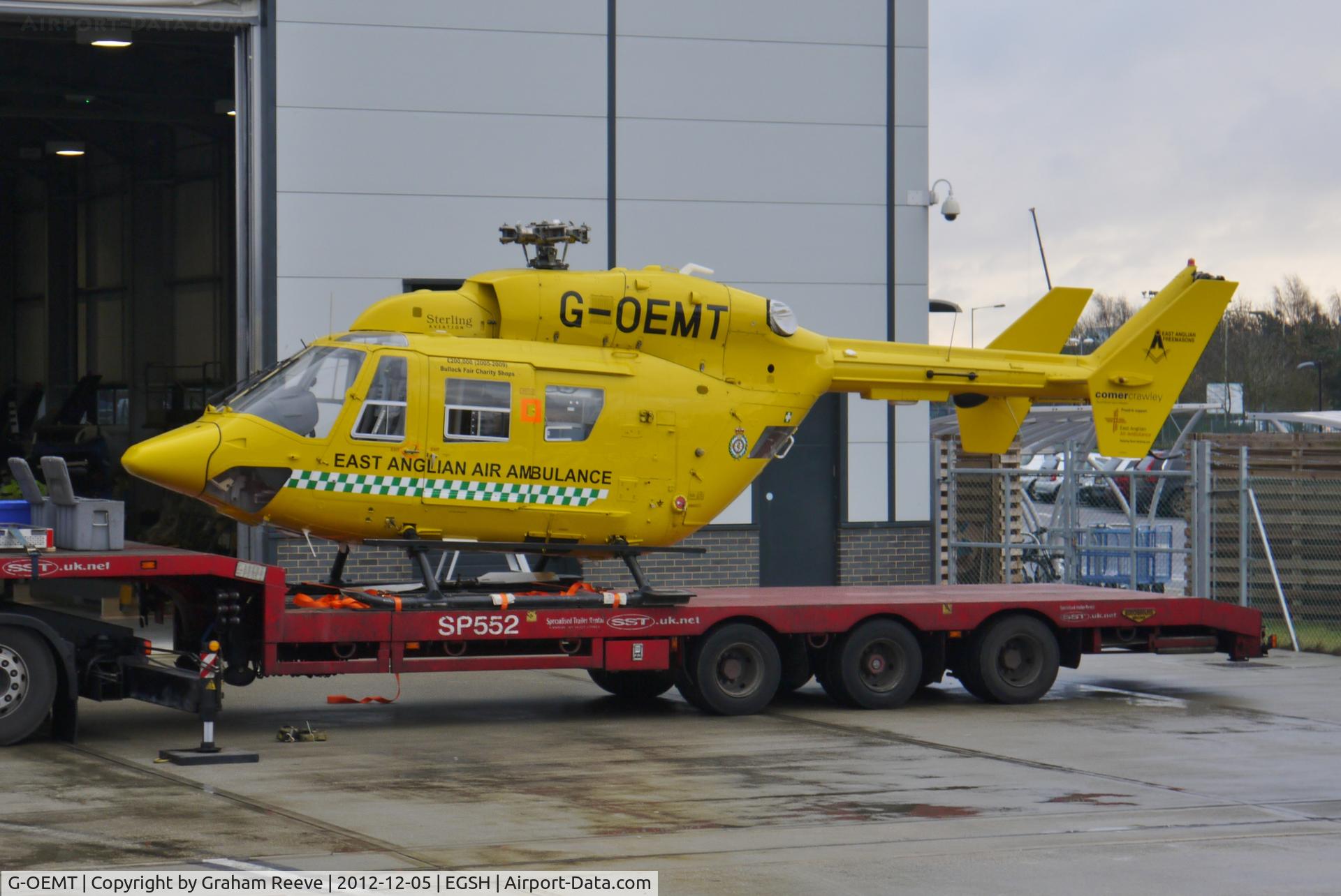 G-OEMT, 2001 Eurocopter-Kawasaki BK-117C-1 C/N 7538, Former  Air Ambulance loaded onto a trailer awaiting to depart by road from Norwich.