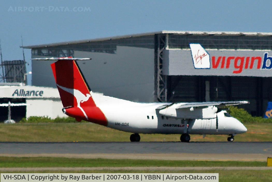 VH-SDA, 1997 De Havilland Canada DHC-8-202 Dash 8 C/N 482, DHC-8Q-202 Dash 8 [482] (QANTASlink) Brisbane-International~VH 18/03/2007. Heat haze is a problem with here.