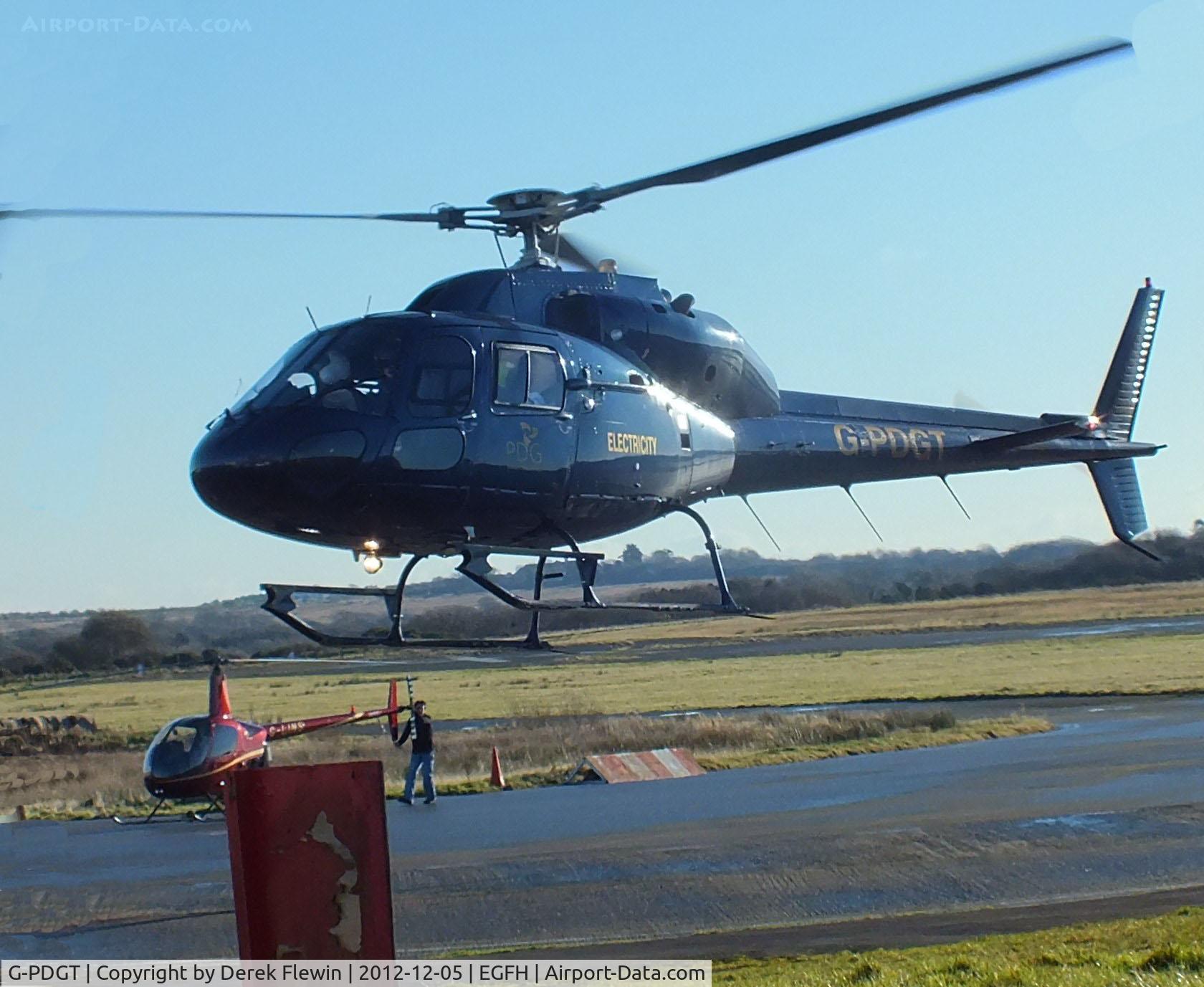 G-PDGT, 1988 Aerospatiale AS-355F-2 Ecureuil 2 C/N 5374, Lifting prior to departing to the west, owned by PDG Helicopters based at Inverness, on lease for powerline surveys.