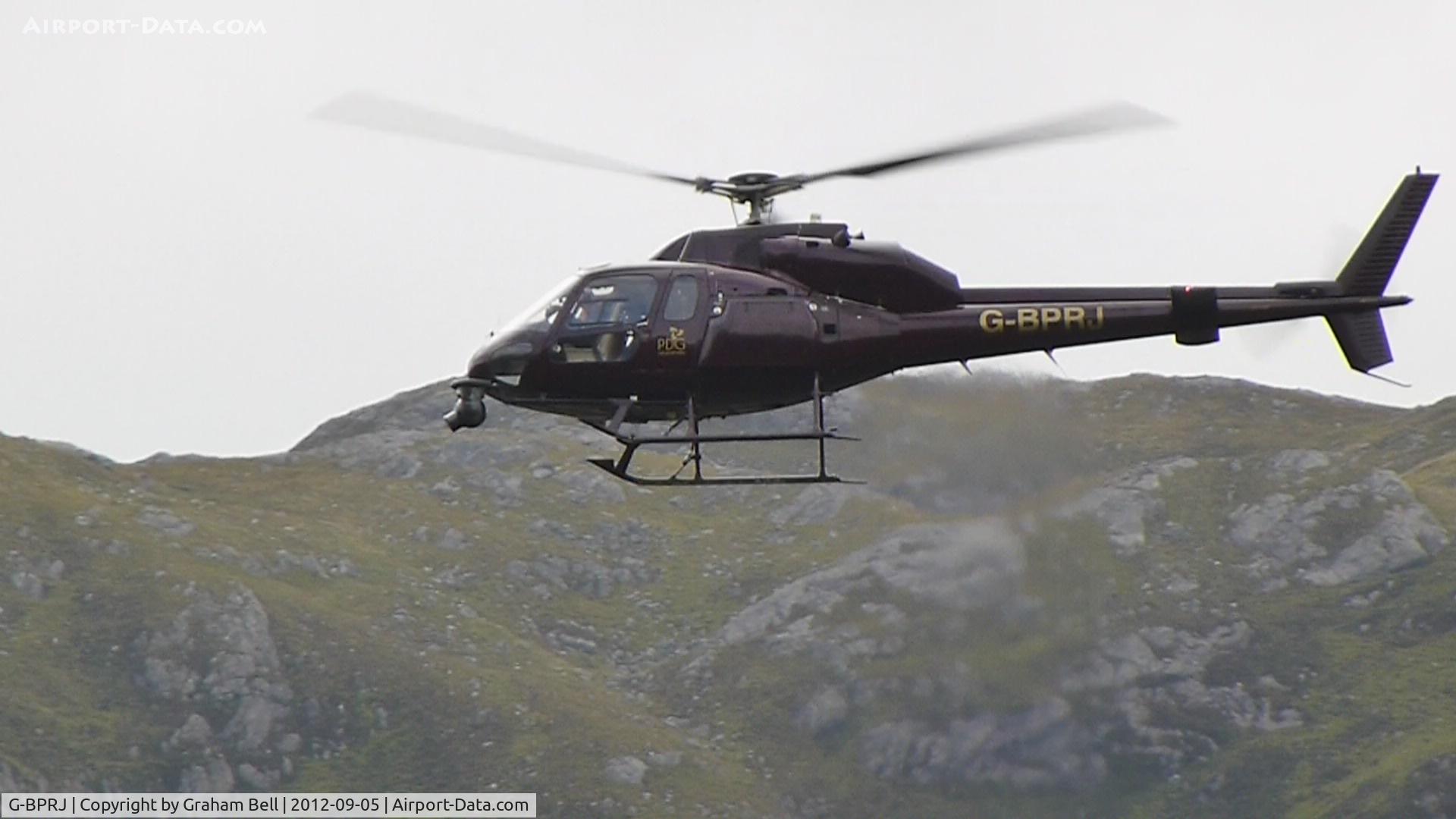 G-BPRJ, 1982 Aerospatiale AS-355F-1 Ecureuil 2 C/N 5201, Seen here near Glenfinnan whilst filming the Jacobite Steam train.