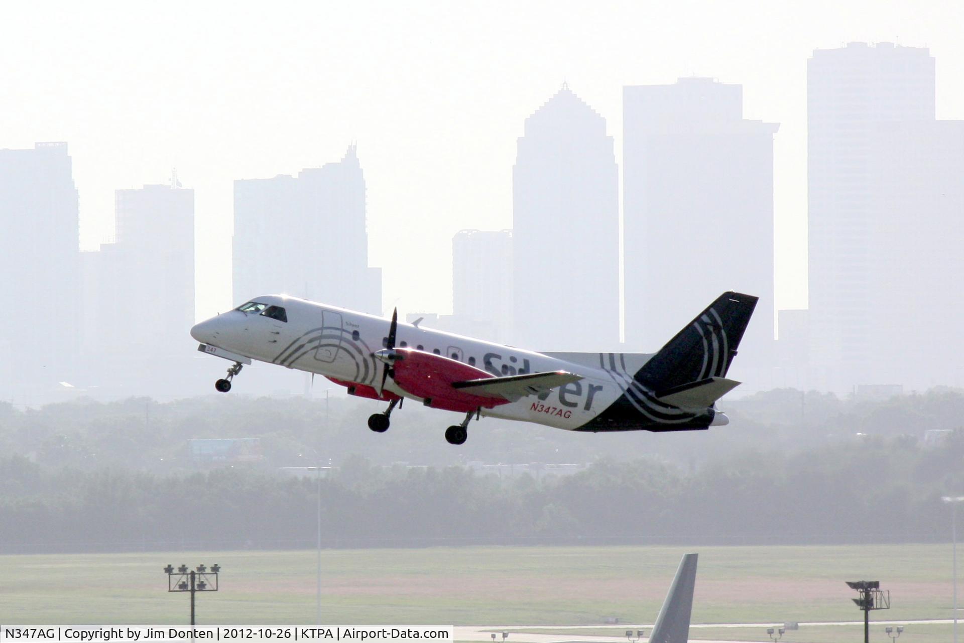 N347AG, 1998 Saab 340B C/N 340B-447, United Flight 4007 operated by Silver (N347AG) departs Tampa International Airport enroute to Key West International Airport