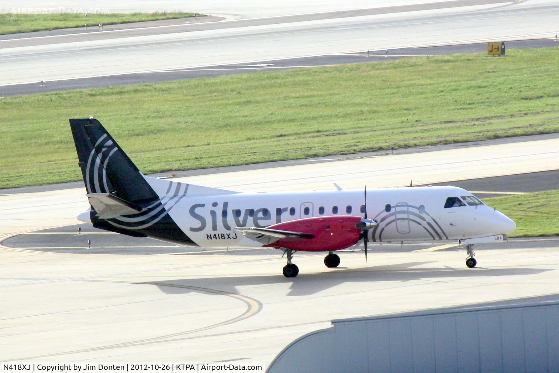 N418XJ, 1997 Saab 340B C/N 340B-418, United Flight 3981 operated by Silver (N418XJ) arrives at Tampa International Airport following a flight from Gainesville Regional Airport