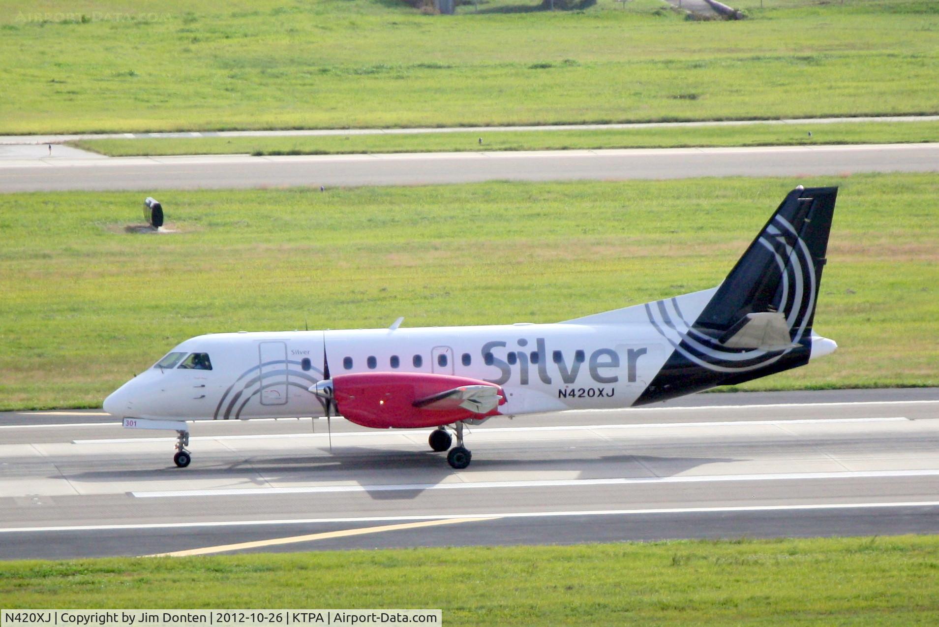 N420XJ, 1997 Saab 340B+ C/N 340B-420, United Flight 4004 operated by Silver (N420XJ) arrives at Tampa International Airport following a flight from Fort Lauderdale-Hollywood International Airport