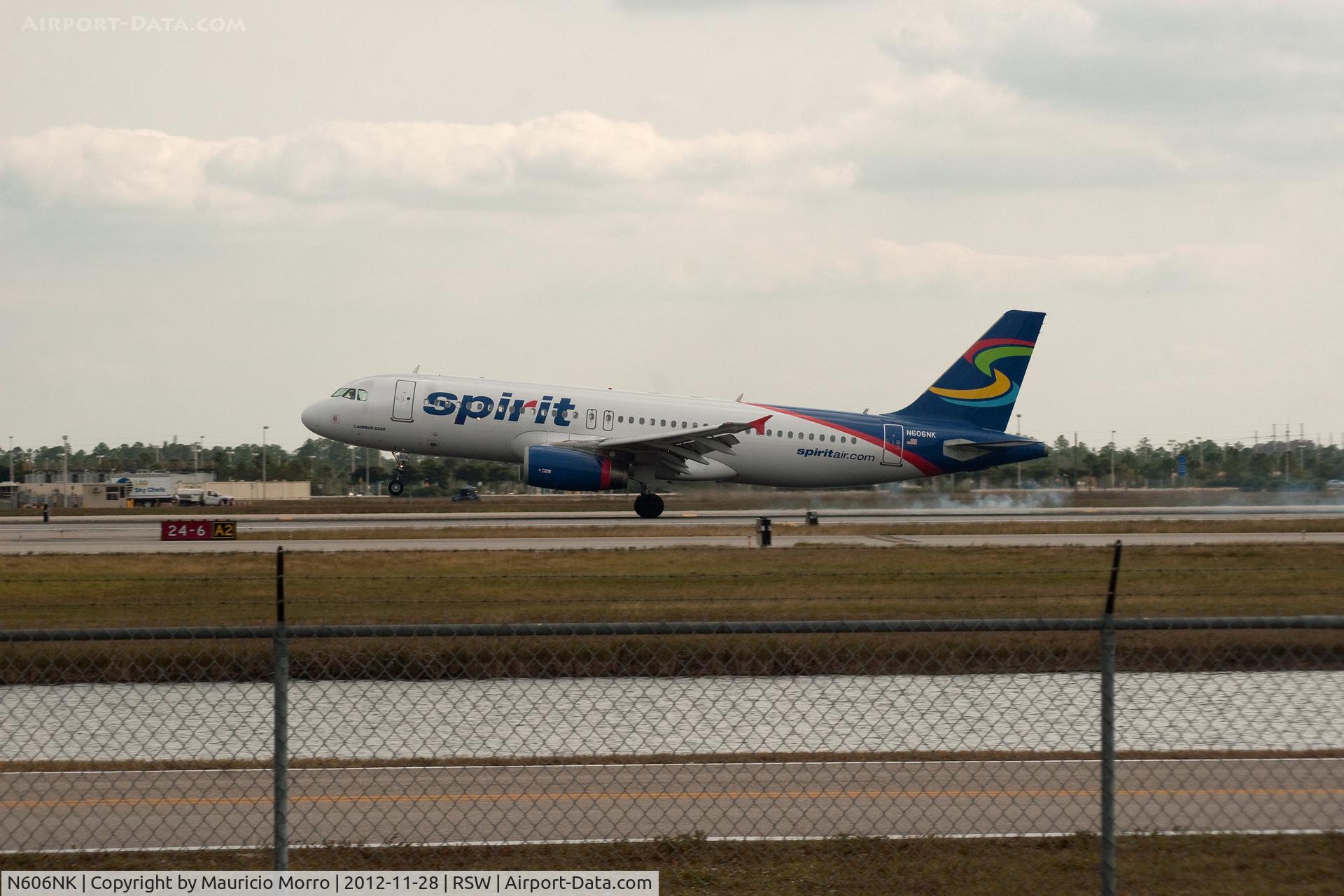 N606NK, 2011 Airbus A320-232 C/N 4592, Spirit A320 touching down RWY 6