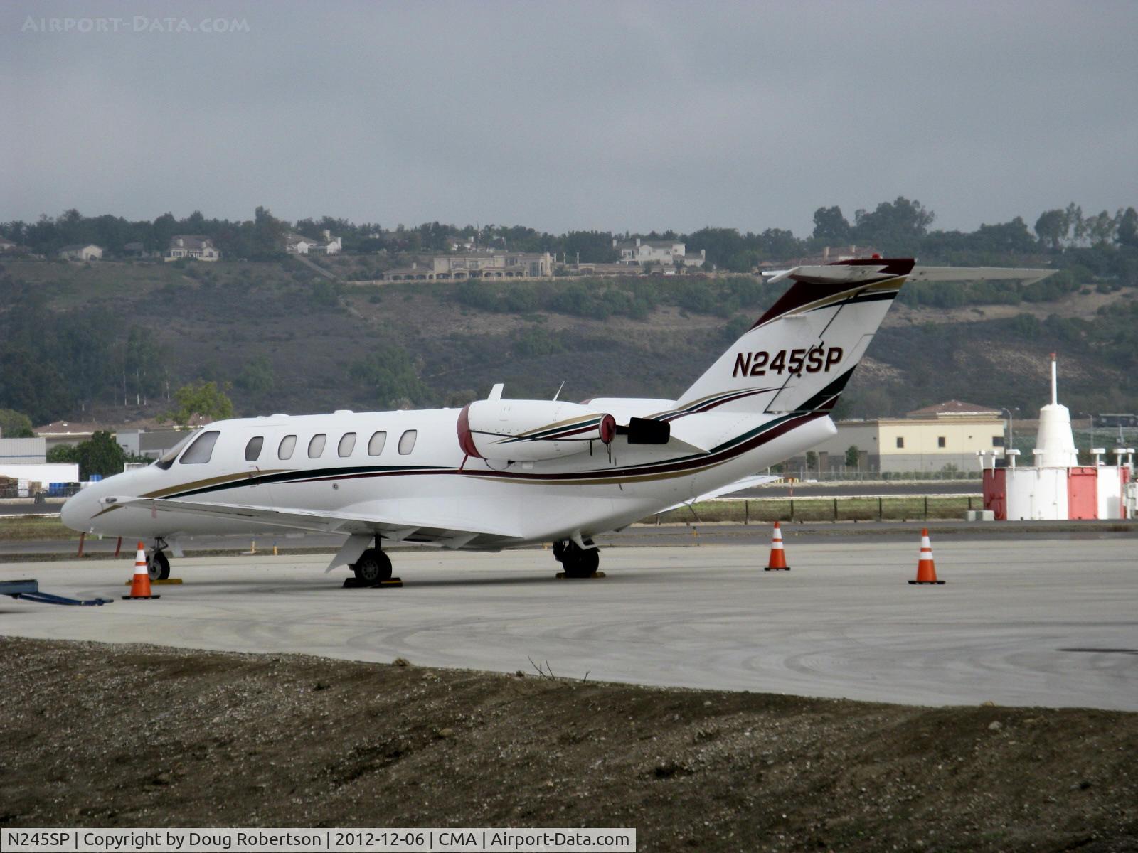 N245SP, 2000 Cessna 525A CitationJet CJ2 C/N 525A0006, 2000 Cessna 525A CITATION CJ2, two Williams FJ 44-2C Turbofans flat rated at 2,400 lb st each. pod-mounted. CMA's 115.8 VOR/DME antenna on-field in right background.