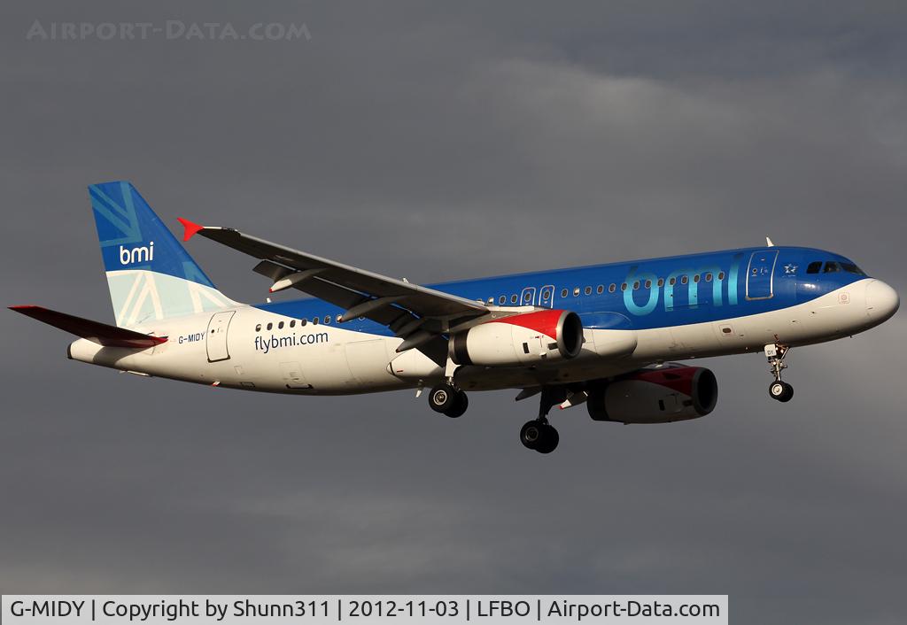 G-MIDY, 1999 Airbus A320-232 C/N 1014, Landing rwy 14L, still in BMI c/s under British Airways call sign as BA374