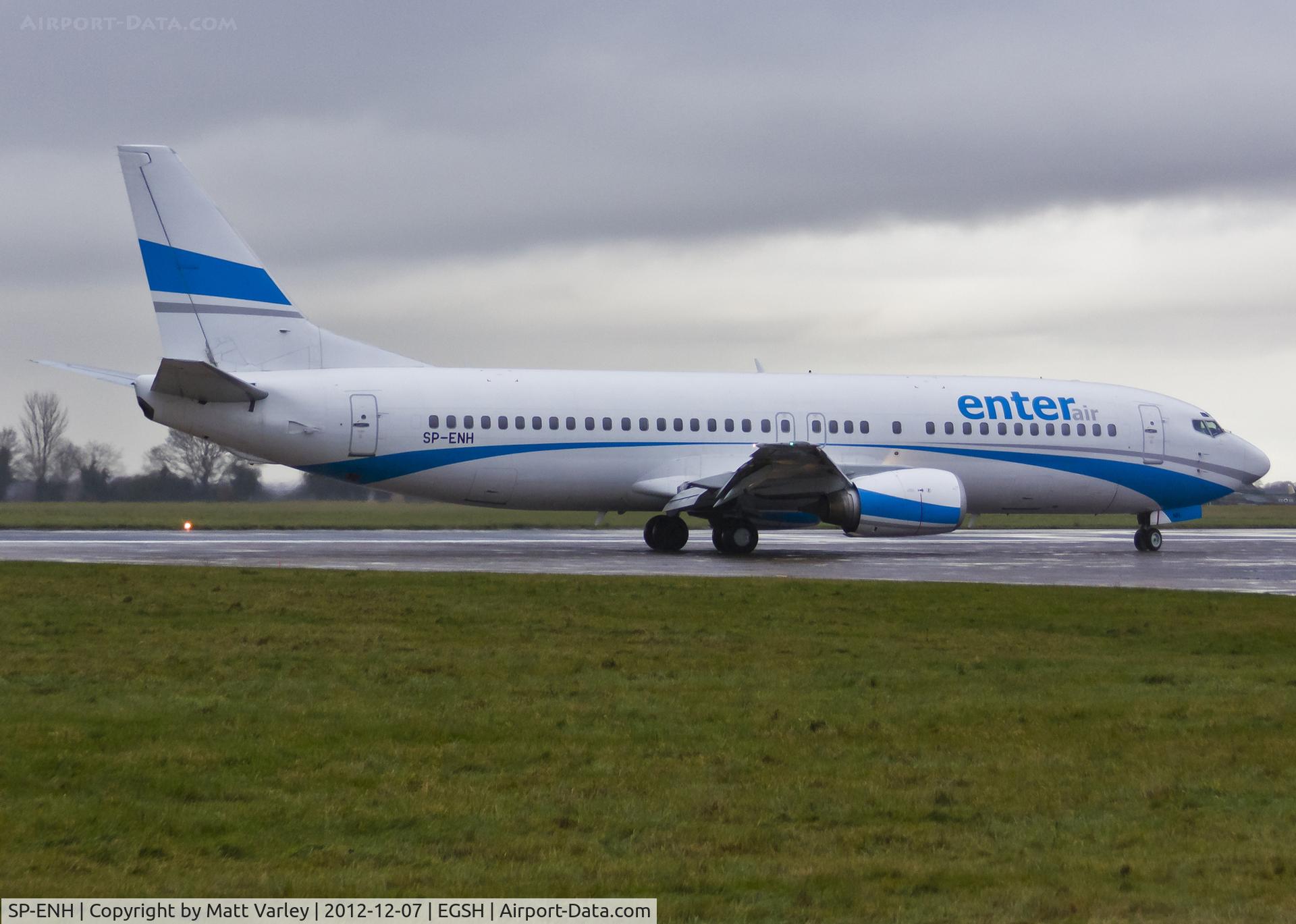 SP-ENH, 1997 Boeing 737-405 C/N 25795, Arriving at a very wet EGSH.