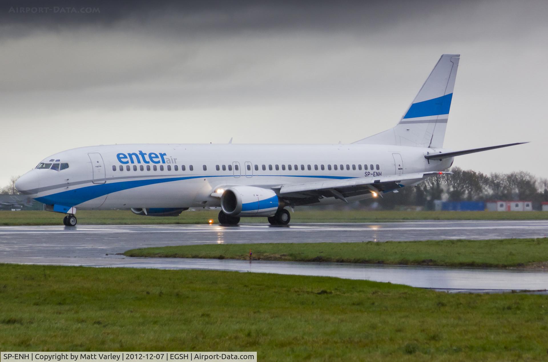 SP-ENH, 1997 Boeing 737-405 C/N 25795, Arriving at a very wet EGSH.