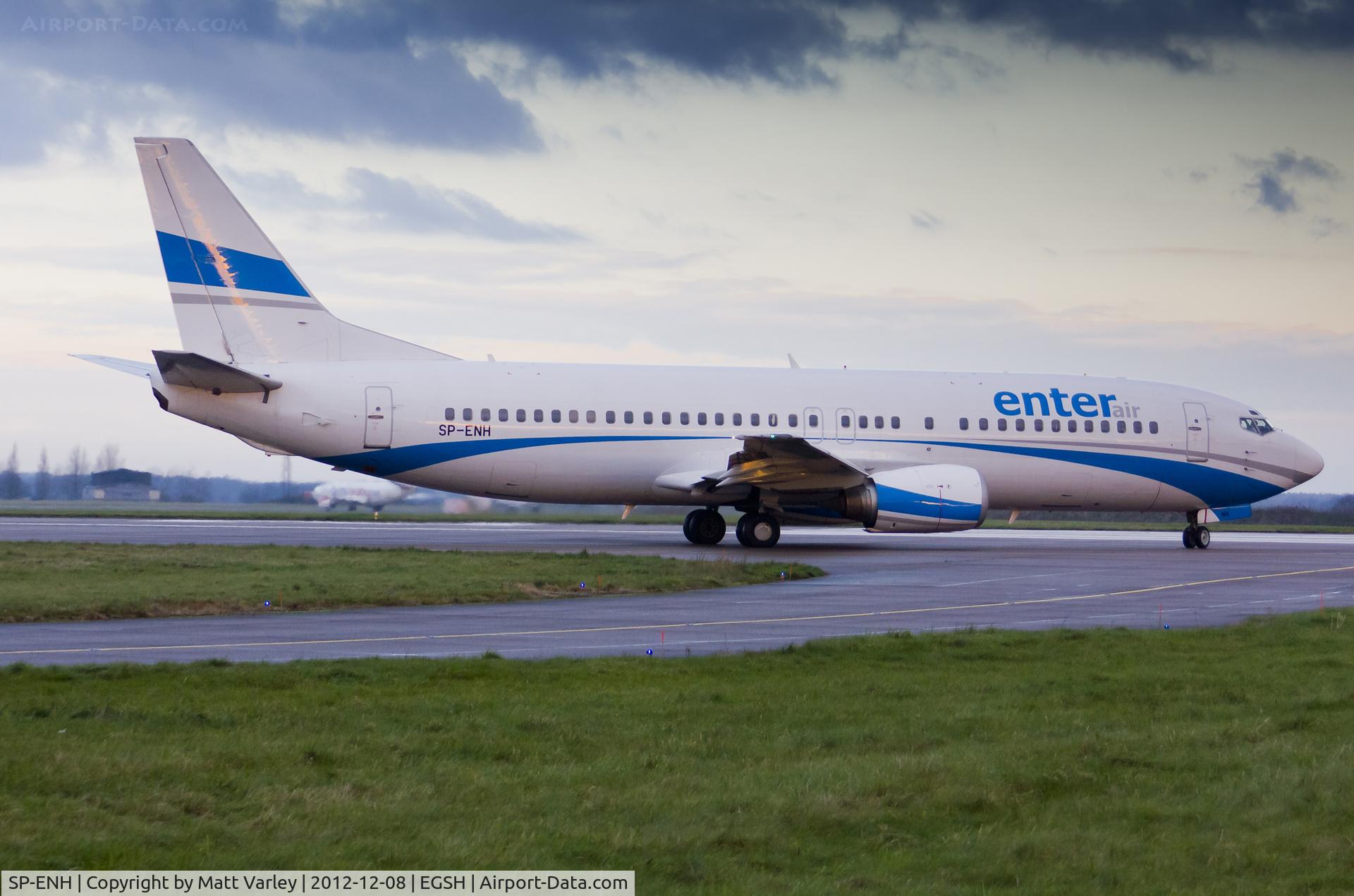 SP-ENH, 1997 Boeing 737-405 C/N 25795, Departing a gloomy EGSH on the yearly Lapland flight