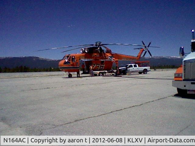 N164AC, 1968 Sikorsky S-64E C/N 64034D, aircrane getting ready to attach tank in leadville.