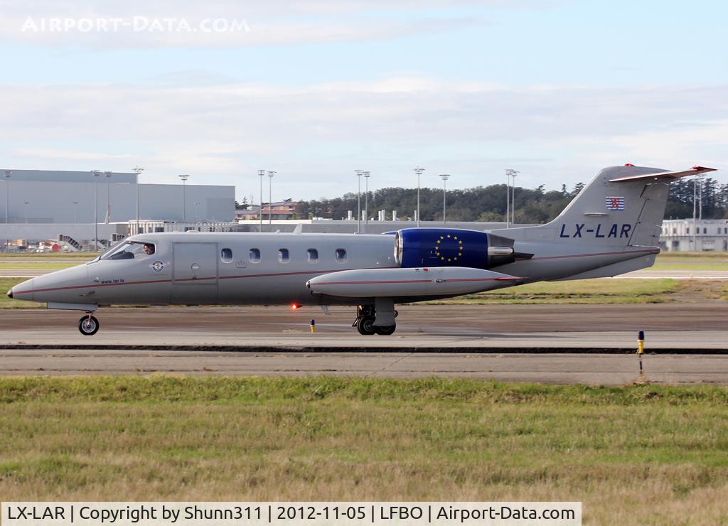 LX-LAR, 1989 Learjet 35A C/N 35A-653, Taxiing to the General Aviation area...