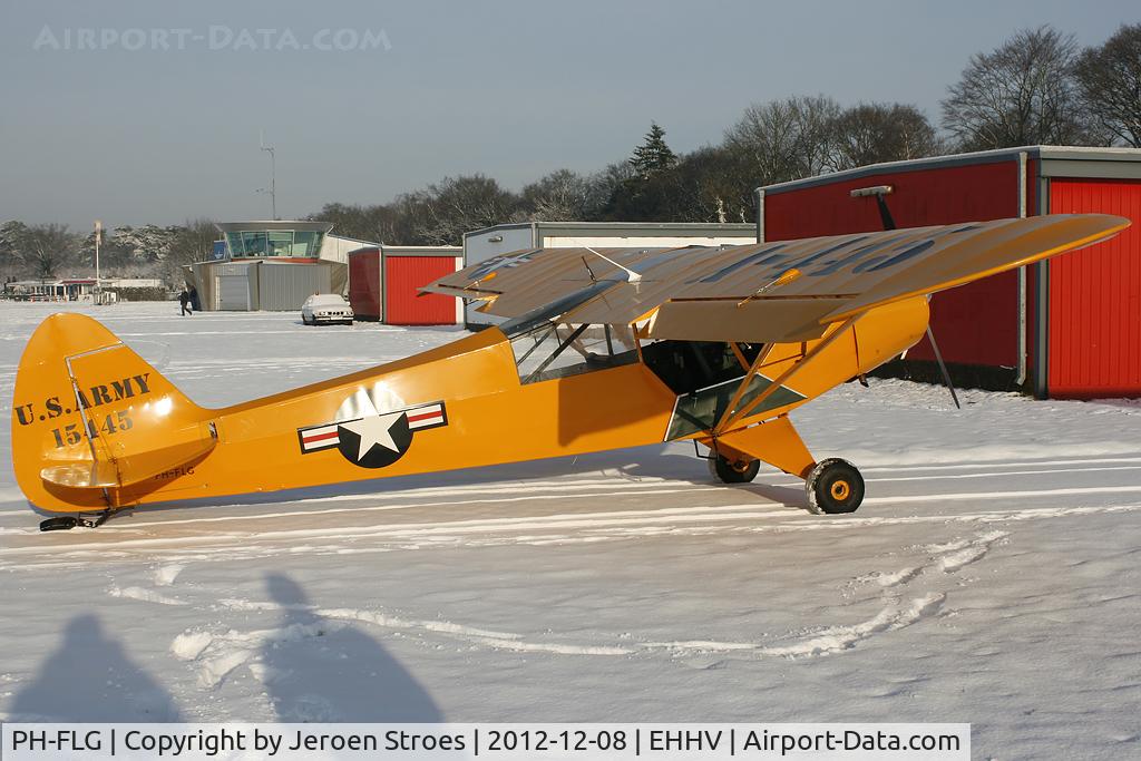 PH-FLG, 1952 Piper L-18C Super Cub C/N 18-1445, Hilversum in the snow!  But the tailwheel just broken by the ice on the taxiway