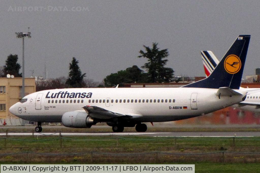 D-ABXW, 1989 Boeing 737-330 C/N 24561, Taxiing to terminal after landing runway 32