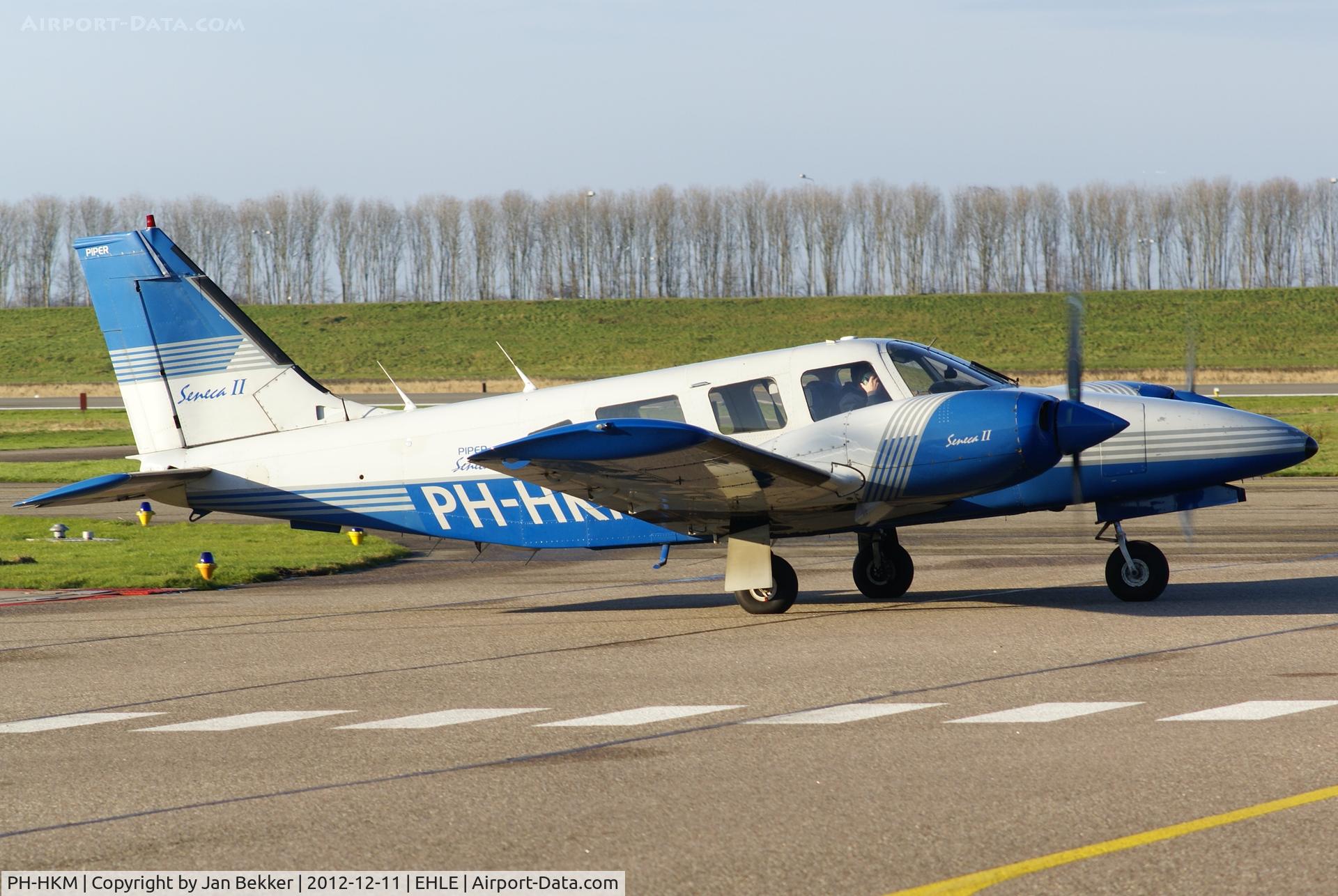 PH-HKM, 1980 Piper PA-34-200T Seneca II C/N 34-8070079, Airport Lelystad on a sunny afternoon.