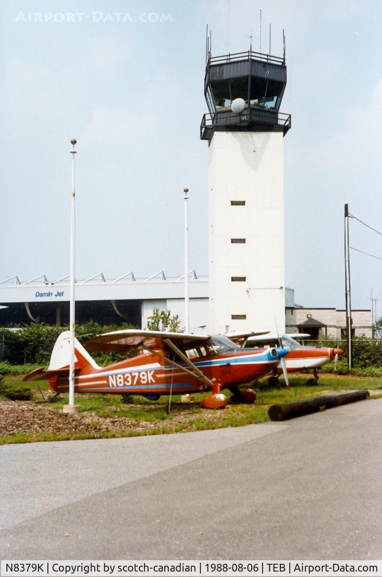 N8379K, 1946 Stinson 108-1 Voyager C/N 108-1379, 1946 Stinson 108-1, N8379K and Control Tower at Teterboro Airport, Teterboro, NJ