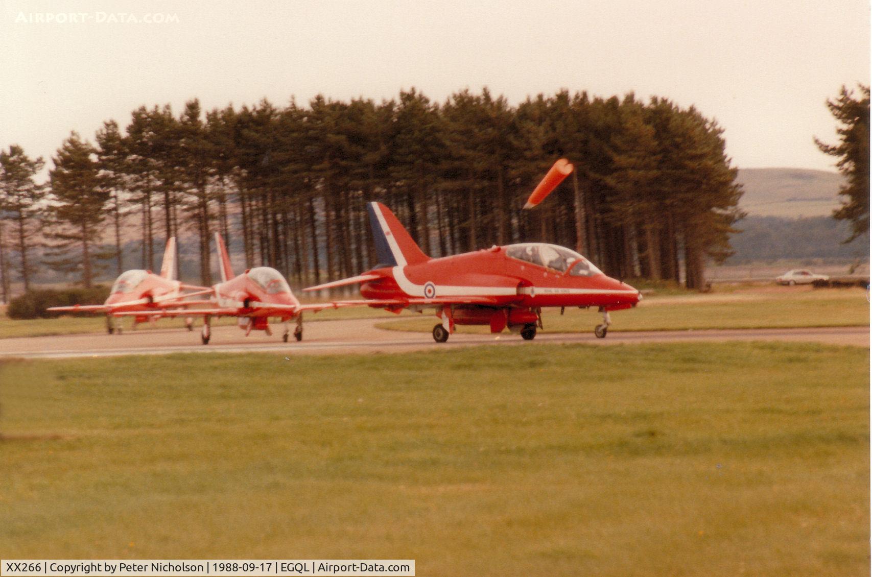 XX266, 1979 Hawker Siddeley Hawk T.1A C/N 102/312102, Hawk T.1A of the Red Arrows aerobatic display team leading a section to the active runway at the 1988 RAF Leuchars Airshow.