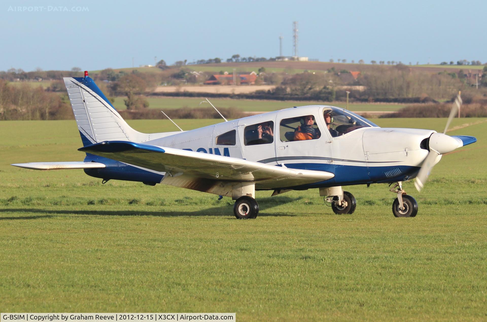 G-BSIM, 1986 Piper PA-28-181 Cherokee Archer II C/N 28-8690017, Just landed.