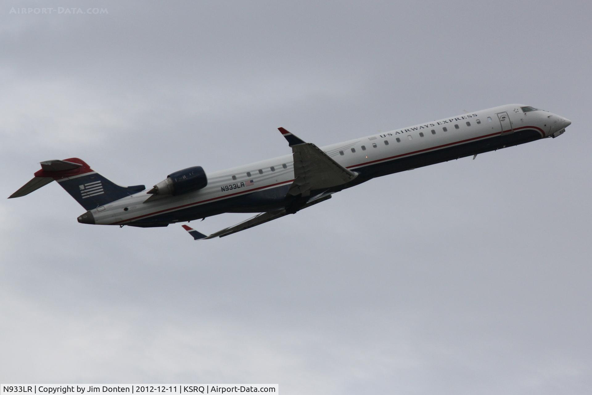 N933LR, 2005 Bombardier CRJ-900ER (CL-600-2D24) C/N 15033, US Air Flight 2678 operated by Mesa (N933LR) departs Sarasota-Bradenton International Airport enroute to Charlotte/Douglas International Airport
